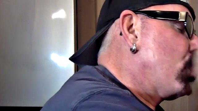 Homemade gloryhole DILF sucks cock at home in closeup