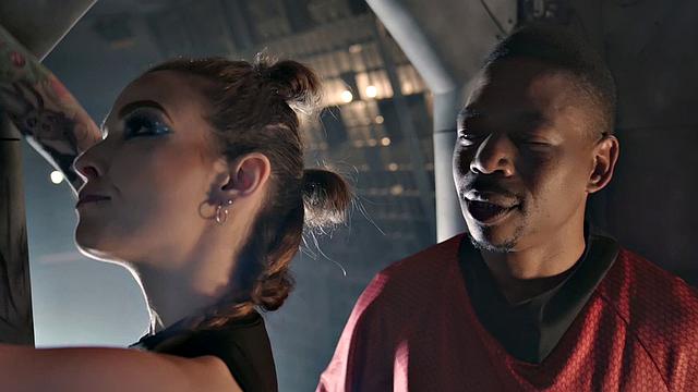 Interracial cowgirl action with a skinny black babe and a smile on her face