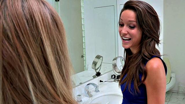 Check out these kinky tattooed babes finger and lick each other's bald pussies in the bathroom