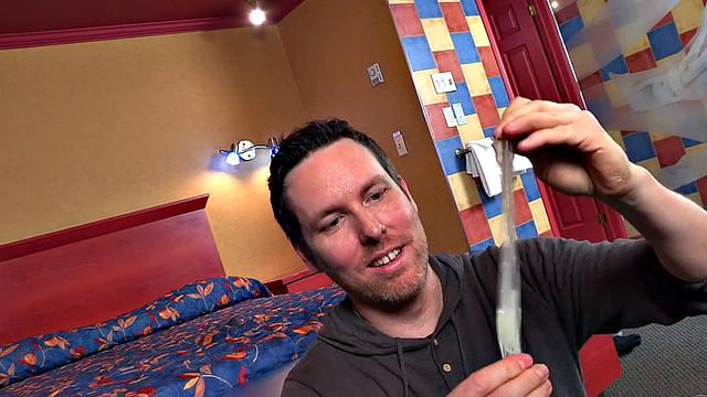 Muscled stud with eye mask wanks and cums in condom