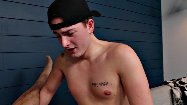 Tattooed stud bareback banged by BF on couch after kissing