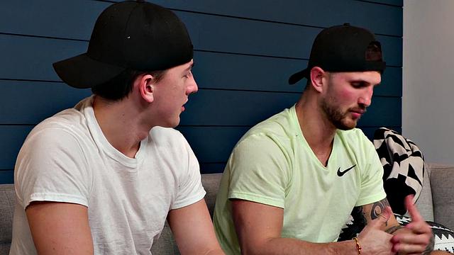 Tattooed stud bareback banged by BF on couch after kissing