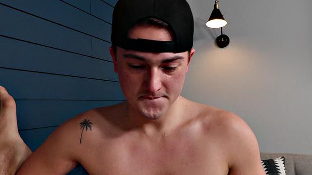 Tattooed stud bareback banged by BF on couch after kissing