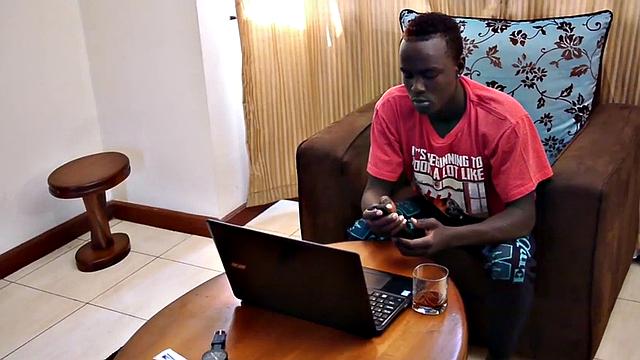 Slim African strips and masturbates in solo action