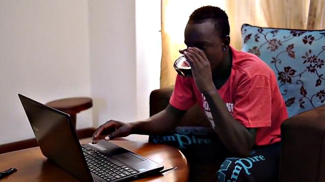 Slim African strips and masturbates in solo action