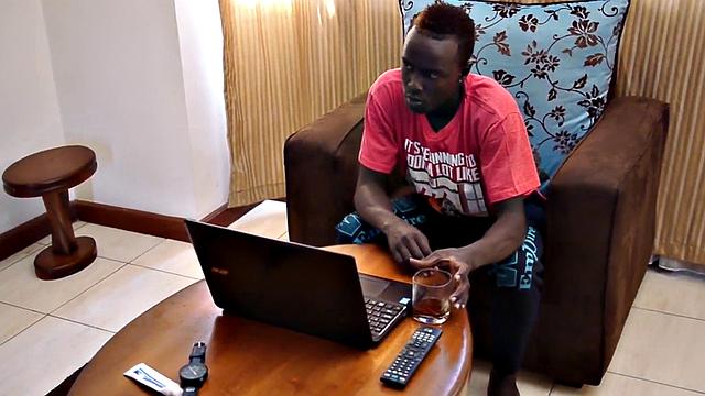 Slim African strips and masturbates in solo action