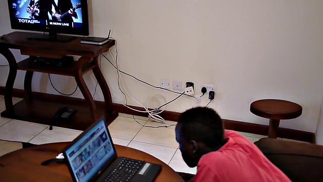 Slim African strips and masturbates in solo action