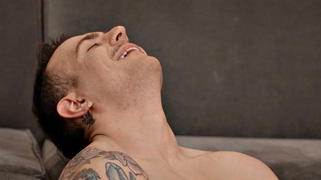 Eager jock solo masturbating in room