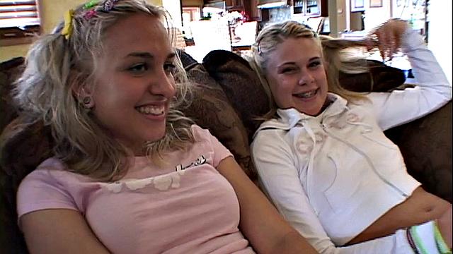 Stripteasing amateur lesbian teens show off tits