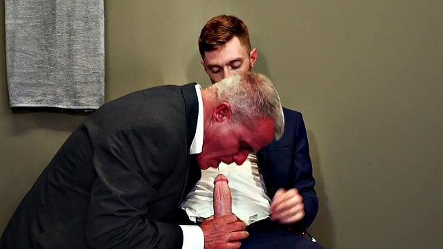 Muscled gray DILF fisting inked otter after blowjob