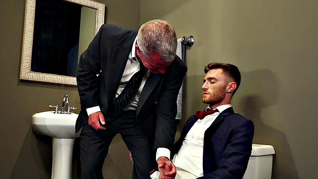 Muscled gray DILF fisting inked otter after blowjob