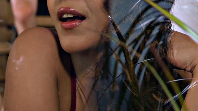 Curly-haired beauty gets a steamy sauna massage and hot fuck