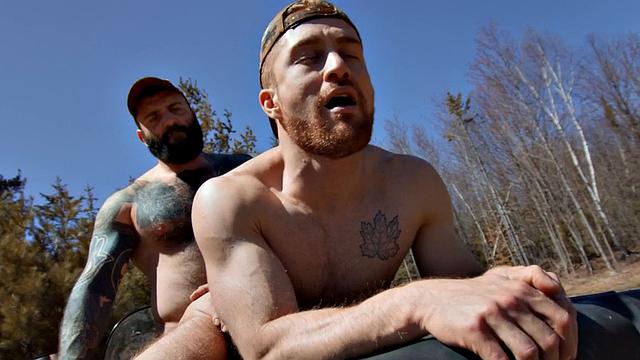 Bearded gay fucks jock in forest on quad