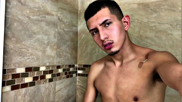 Standing in the shower, Roman Blake strips out of his shorts and boxers to reveal his slim and smooth body. He quickly works up a boner and then begins beating off.
