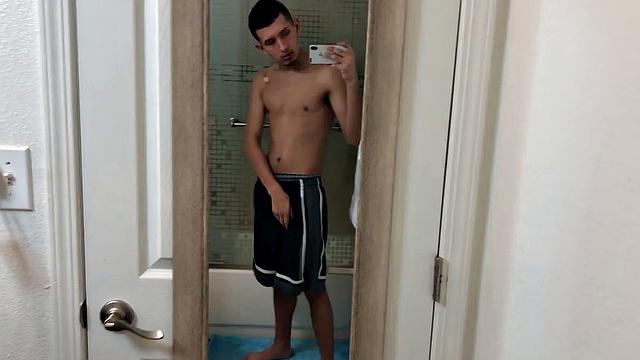 Standing in the shower, Roman Blake strips out of his shorts and boxers to reveal his slim and smooth body. He quickly works up a boner and then begins beating off.