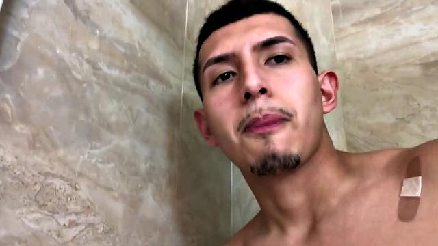 Standing in the shower, Roman Blake strips out of his shorts and boxers to reveal his slim and smooth body. He quickly works up a boner and then begins beating off.