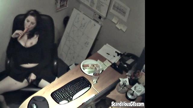 Secretary rubbing her tits and masturbating
