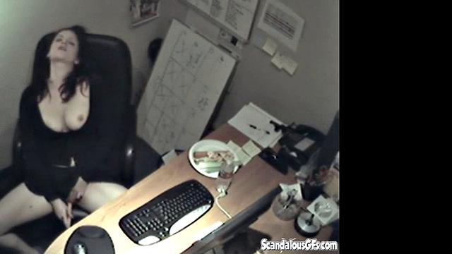 Secretary rubbing her tits and masturbating