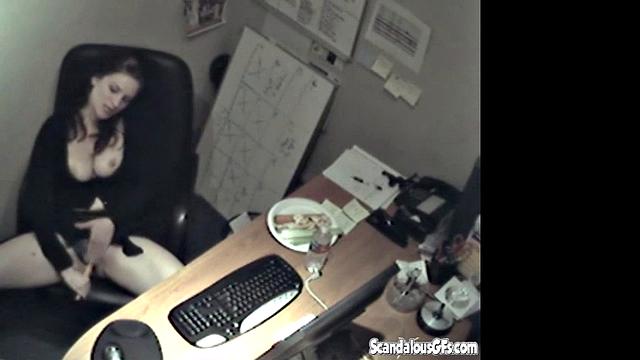 Secretary rubbing her tits and masturbating