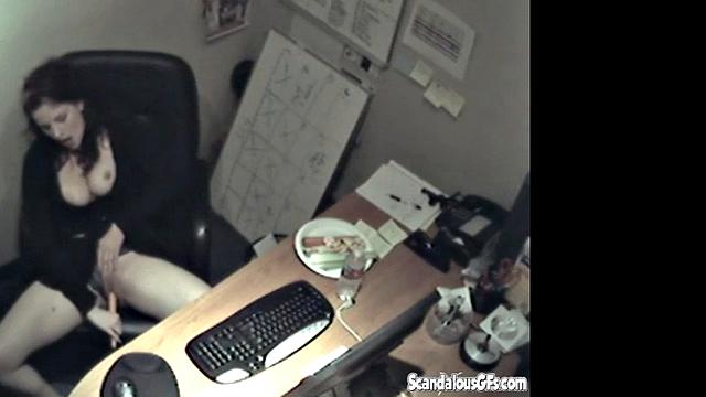 Secretary rubbing her tits and masturbating