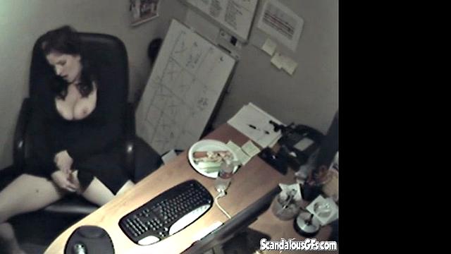 Secretary rubbing her tits and masturbating
