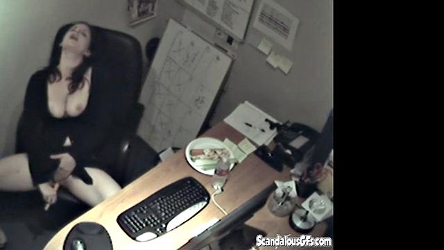 Secretary rubbing her tits and masturbating