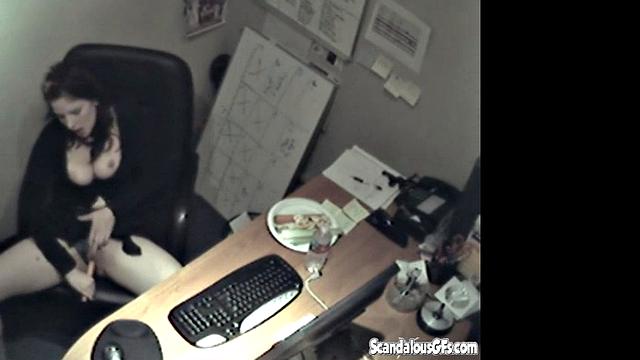 Secretary rubbing her tits and masturbating