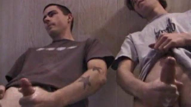 He shoots his load against the glass while another guy watches, thick cum splattering everywhere