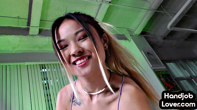 Petite asian cutie wanking lover's dick