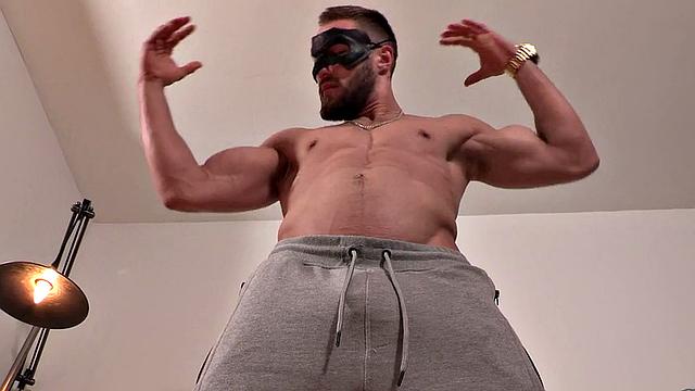 Tattooed masked stud jerks and cums after casting