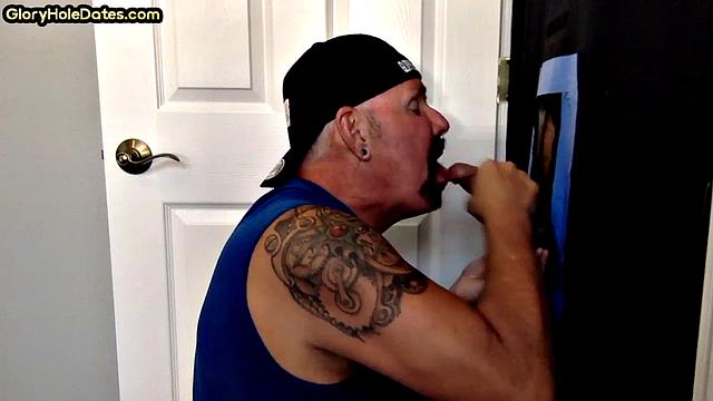 Real tattooed gloryhole DILF sucks cock in sex