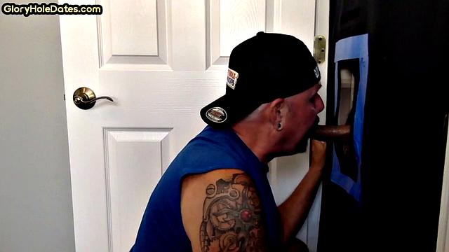Real tattooed gloryhole DILF sucks cock in sex