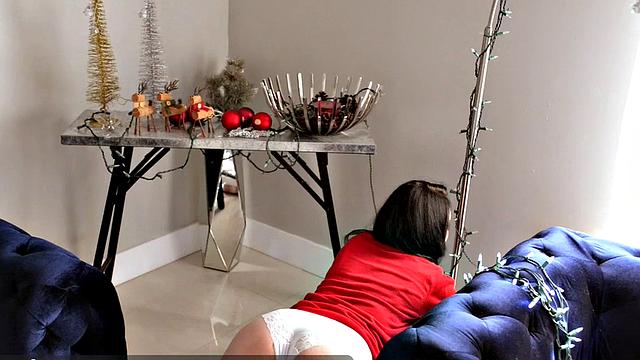 Merry Christmas from Lenna, a brunette teen with perky tits