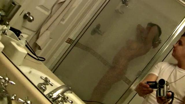 Busty shower babe gets licked