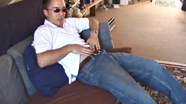 John is back and this time wearing a polo shirt and shades. He settles down and gets into his alone time. After oiling up his dick, John strokes it while watching porn and occasionally narrating.