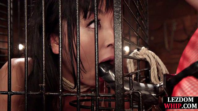 Tied Asian slut toys with her mistress