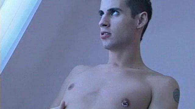 Sexy Gage Powers strokes and caresses his sculptured body to orgasm. After a sensual session in the window, the 19-year-old sits down in a chair and begins beating off.