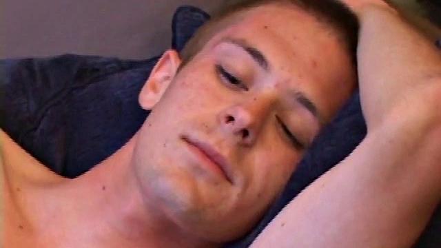 Tommy Nolan quickly strips naked and begins pulling on his dick, while watching a porn video. He works up a nice stiff one and then shows us his pretty ass. Then he gets down to business, stroking his hard cock.