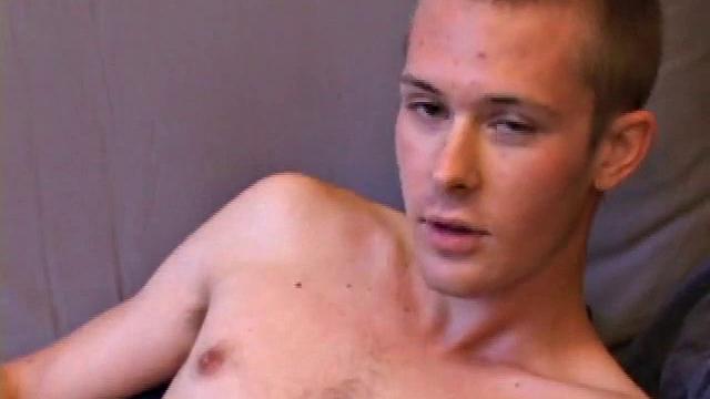 Tommy Nolan quickly strips naked and begins pulling on his dick, while watching a porn video. He works up a nice stiff one and then shows us his pretty ass. Then he gets down to business, stroking his hard cock.