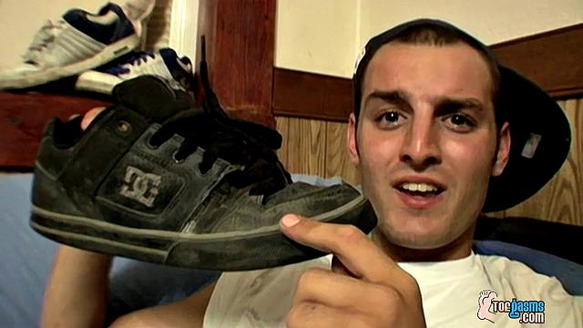 Ajax strokes his cock and shows off his foot obsession