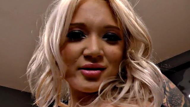 Tattooed babe sucks and rides dong while talking dirty