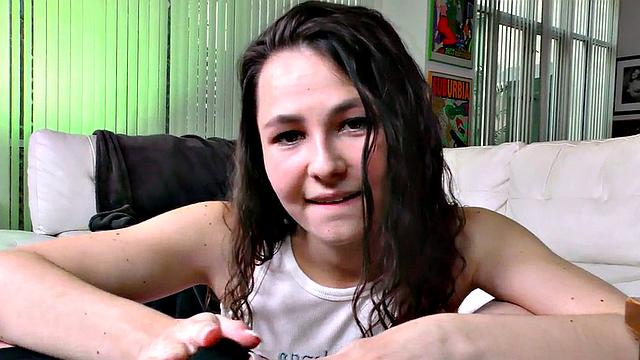 Facial babe strokes lover's cock while dirty talking