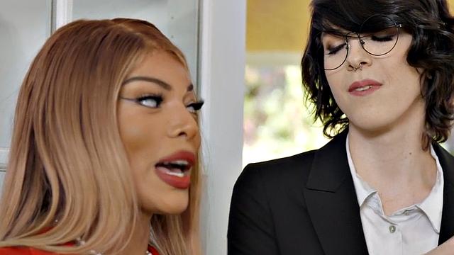 Blonde and brown-haired shemale gets her ass slammed from behind in glasses