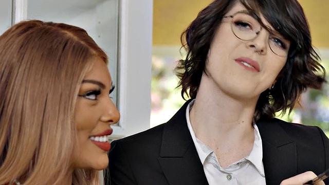 Blonde and brown-haired shemale gets her ass slammed from behind in glasses