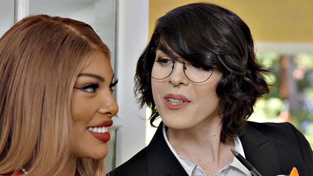 Blonde and brown-haired shemale gets her ass slammed from behind in glasses