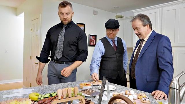 Blonde and brown-haired shemale gets her ass slammed from behind in glasses