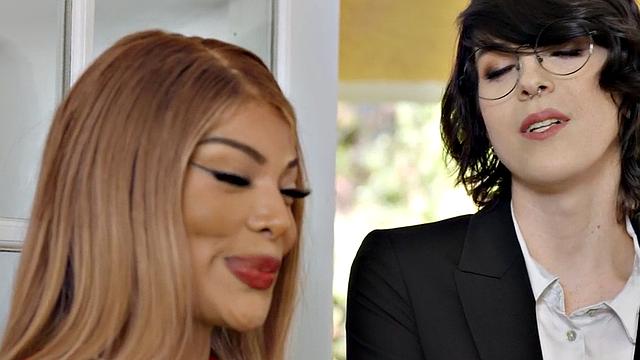 Blonde and brown-haired shemale gets her ass slammed from behind in glasses