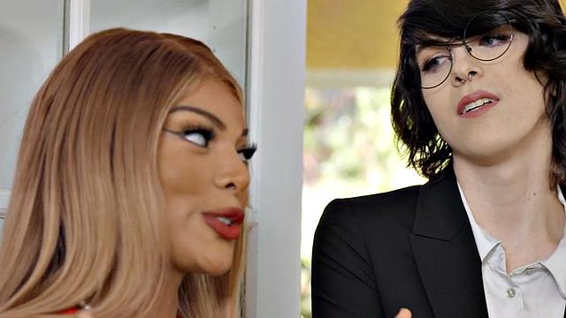 Blonde and brown-haired shemale gets her ass slammed from behind in glasses