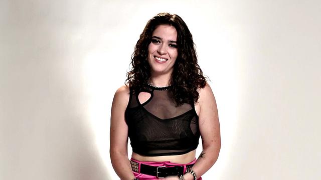 Cute babe teasing with vibrator