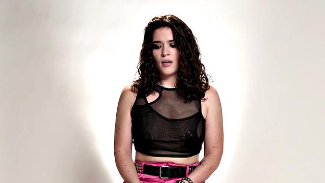 Cute babe teasing with vibrator